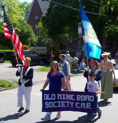 Chapter members march with Children in Memorial Day parade.